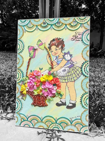 A black and white photo of the girl-themed wall art, emphasizing the composition and textures.