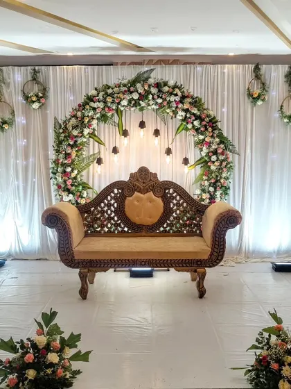 The full view of the modern floral arch stage.