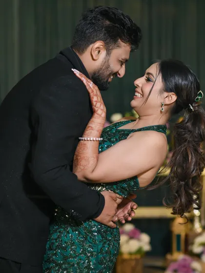 A playful dip on the dance floor. This shot captures the fun, chemistry, and trust between the couple during their high-energy cocktail night.