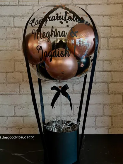 Celebrating a special union with this custom congratulations Bobo Box. The design uses a chic black and rose gold color scheme with a personalized message for the happy couple, Meghna and Jagdish.