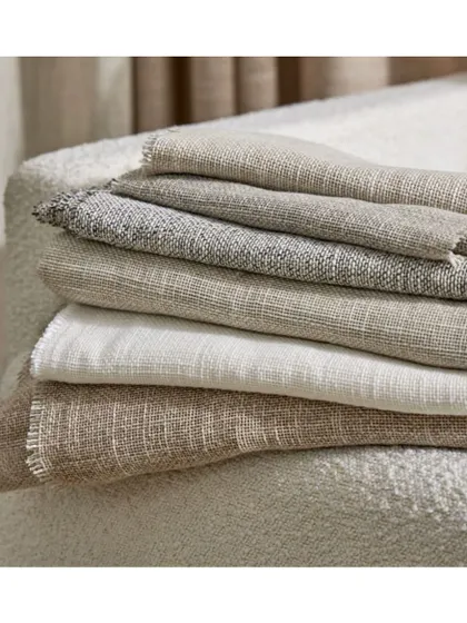 'Luta' is a soft, textured sheer with a continuous 300cm width, making it incredibly versatile. Its timeless neutral palette and subtle texture are suitable for a myriad of sophisticated interiors.