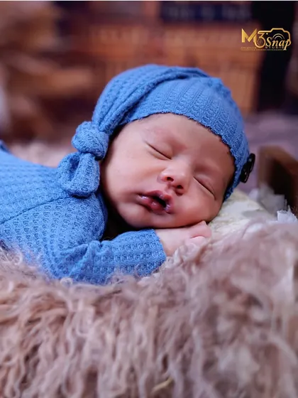Another beautiful close-up, focusing on the baby's delicate features. I always handle newborns with the utmost care to keep them safe and comfortable.