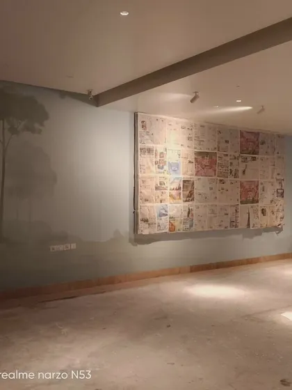The mural work in progress, showing the scale of the project.