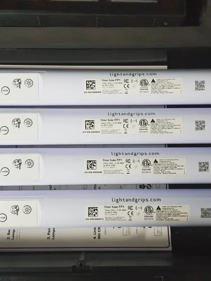 A case of Astera Titan Tubes, fully charged and ready for a shoot. These wireless, battery-powered LED tubes are essential for creating dynamic lighting effects, accent lighting, or rigging in tight spaces.