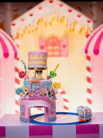 The incredible, detailed cake from the Candyland party, complete with a miniature train and candy decorations.