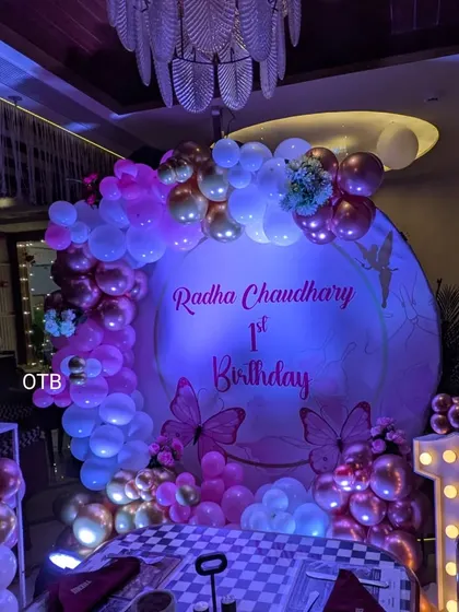 This wide shot shows the full first birthday setup in the venue. I can work with you to make sure the decor complements the space perfectly.