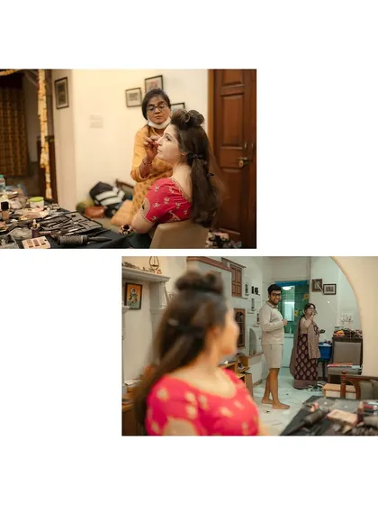 A behind-the-scenes look at the bride getting ready, with the groom looking on from the mirror's reflection.