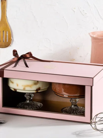 The same classic pairing of Tiramisu and Dark Chocolate Mousse, shown here with the pink version of our twin gift box.