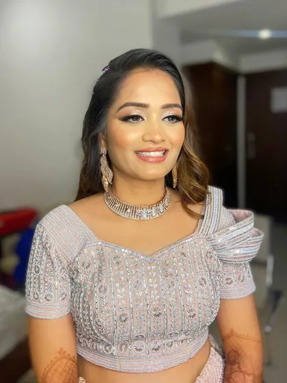 Not holding back on the glitter for Pooja's sangeet. I created a full-on silver glitter eye to match her stunning embellished lehenga.