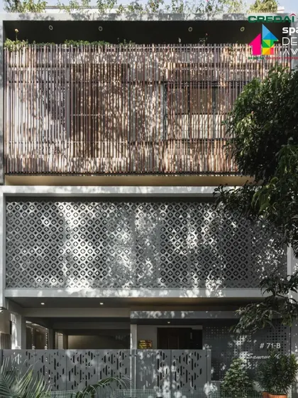 The facade of our '10x10 Residence' project demonstrates how we reinterpret traditional motifs for contemporary living. The prominent screen is a modern 'jaali', with patterns derived from classic Rangoli designs, which filters light and creates intricate shadow patterns within the home while ensuring privacy on a compact urban site.