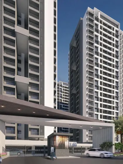 The main entrance view for the Regency Astra project in Pune. The design of the gate and the flanking towers establishes a strong sense of arrival and introduces the modern architectural language of the development.