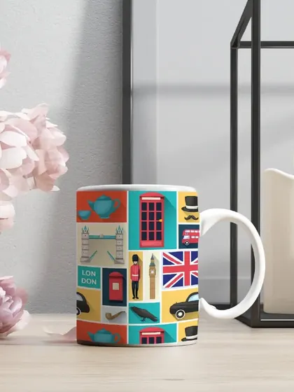 Bring a touch of London to your morning routine with this vibrant, themed coffee mug. It's a fun and quirky gift for travel lovers.