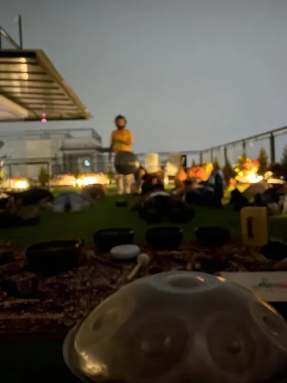 A rooftop sound healing session for a hackathon in Koramangala. The handpan in the foreground is ready to help these tech professionals take a much-needed break and rejuvenate their minds.