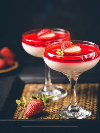 A sweet and elegant dessert option, my Strawberry Panna Cotta. This creamy dessert is topped with a fresh strawberry coulis and served in a beautiful glass.