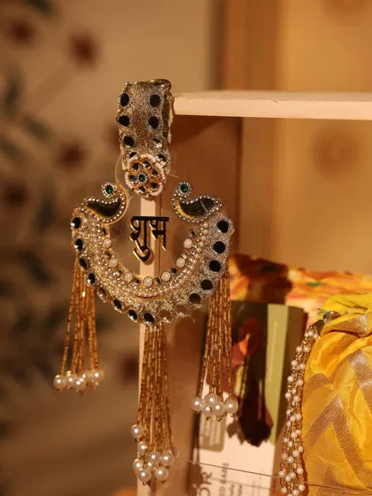 A close-up of the 'Shubh' hanging, a beautiful piece of decor included in my Diwali collection.