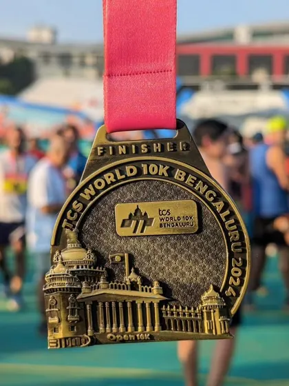 The finisher medal for the TCS World 10K Bengaluru 2024. A beautifully designed medal for a world-class event.