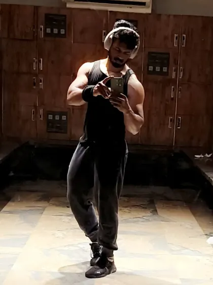 Posing in the locker room. This is my canvas, and every day I work to add more detail and definition.
