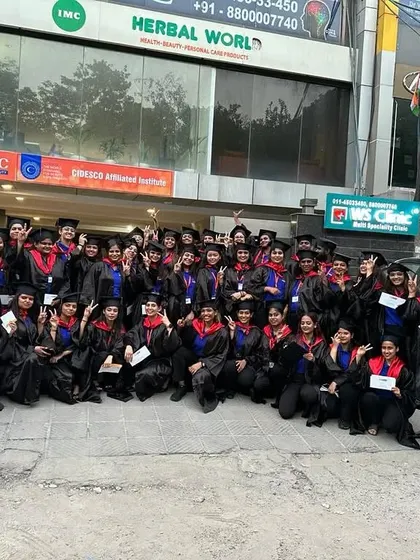 A group photo of our proud graduates in their caps and gowns outside our institute. Earning a CIDESCO-affiliated certification is a major step toward becoming a recognized professional in the beauty industry.