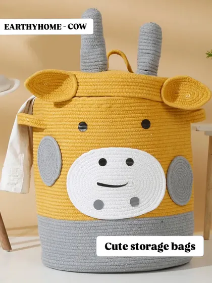 This adorable cow-themed storage basket is perfect for a nursery or playroom. The neutral colors and cute design make it a versatile organization accessory.