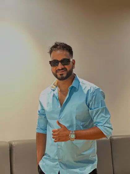 A thumbs-up shot from a private party.