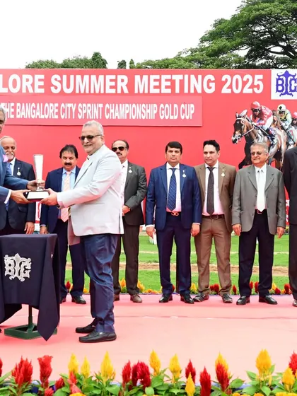 The Bangalore City Sprint Championship Gold Cup is awarded to the owners of Time and Tide by former Chairman Mr. V. Harimohan Naidu.