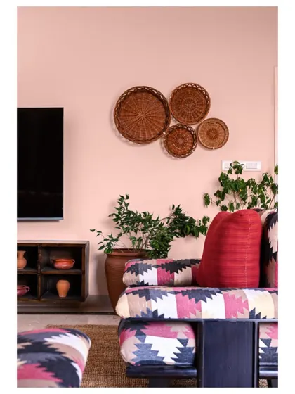 A closer look at the patterned fabric and earthy textures in the cozy family lounge.