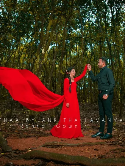 The long trail of the gown creates a sense of movement and romance. It's a versatile piece that allows photographers to capture a wide variety of creative and dynamic shots.