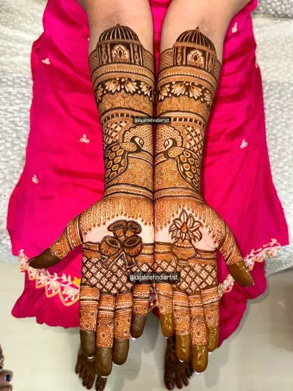 The full view of this peacock and kalash bridal design, showing the rich, dark stain.