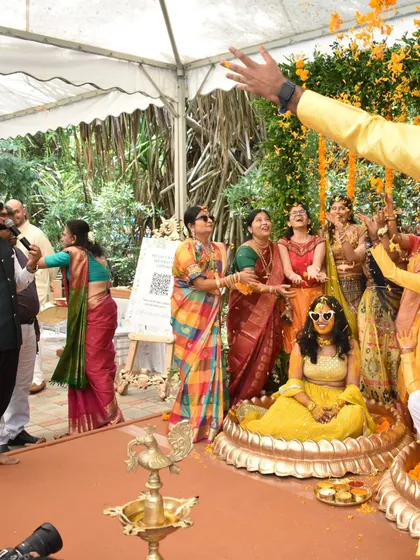 The 'Phoolon ki Haldi' or flower shower is a beautiful part of the ceremony. I orchestrate these moments for the perfect photo opportunity.