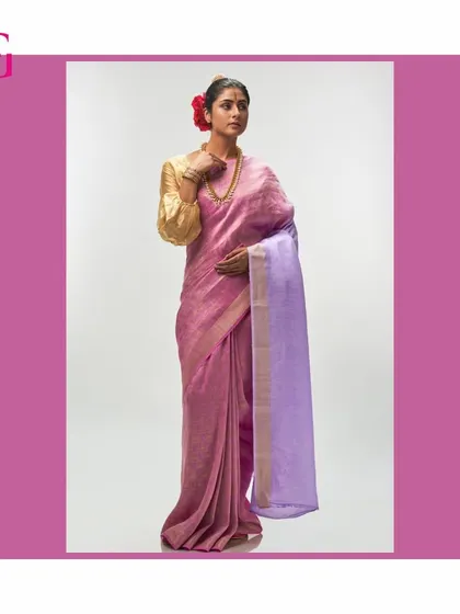 Another look at the pink and lavender saree, highlighting its soft color palette and luxurious texture.