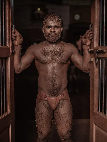 Candid portraits and moments from within the taleem, showing the wrestlers in moments of preparation and quiet intensity. These photos offer a behind-the-scenes look at their world.