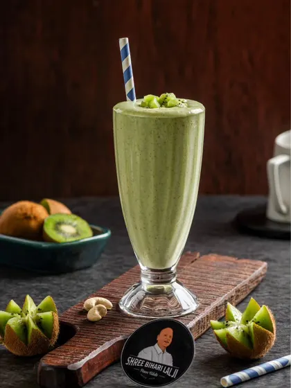 A refreshing kiwi milkshake, with its natural green color and simple styling.