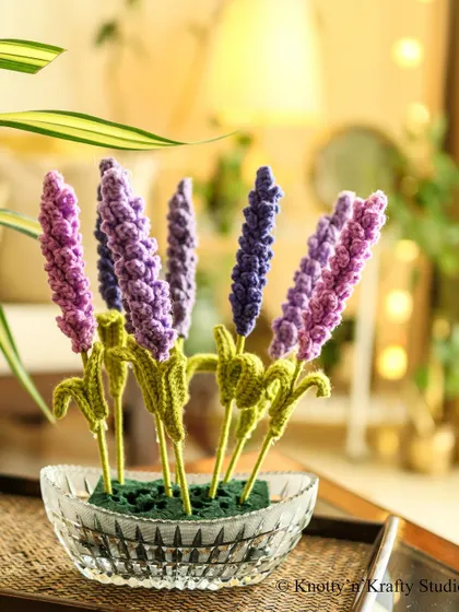 Lovely Lavenders. Making these flowers gave me the opportunity to pull out all the shades of purple yarn I had. A yarn hoarder's dream.