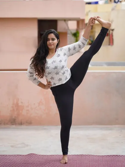 The Extended Hand-to-Big-Toe pose (Utthita Hasta Padangusthasana) is a fantastic way to work on hamstring flexibility and balance at the same time.