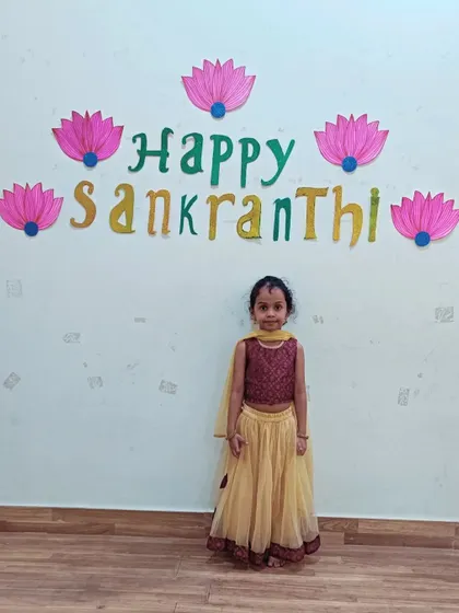 Another one of our students enjoying the Makar Sankranti celebration in her festive attire.