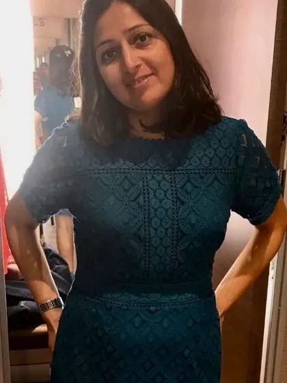 Another fantastic option we found. This teal lace dress is elegant and fits her beautifully, showing how the right color and texture can make you feel incredible.