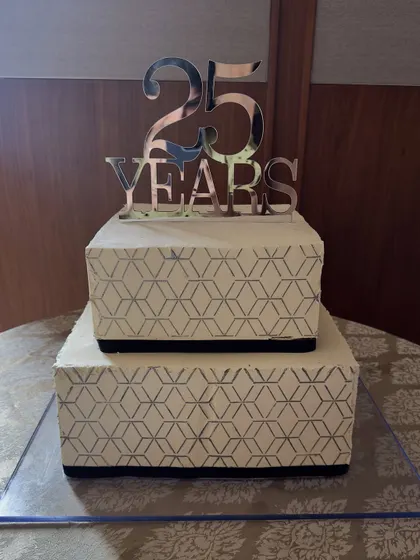 Another view of the geometric 25th-anniversary cake, highlighting the clean lines and precise stencil work that went into this sophisticated design.