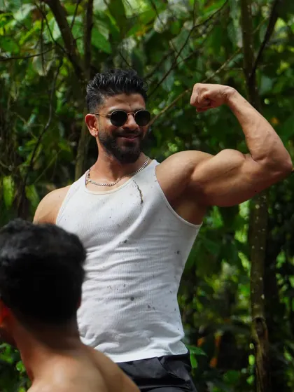 A quick flex while exploring the outdoors. Functional strength and a great physique are rewards of a disciplined fitness journey.
