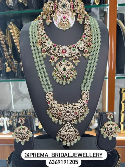 A unique pastel green beaded set with a Kundan-style choker and haaram.