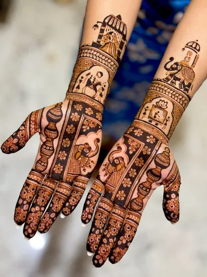 The full bridal set for Divya's wedding. One arm depicts a bride in a doli, while the other shows an elephant procession, telling a complete wedding story.