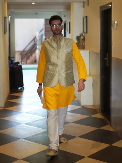 Striding through the corridor of the resort, ready to get to the venue and kick off the celebrations.