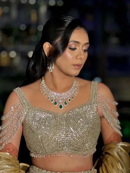 A detailed shot of the makeup, focusing on the flawless base and soft contouring.