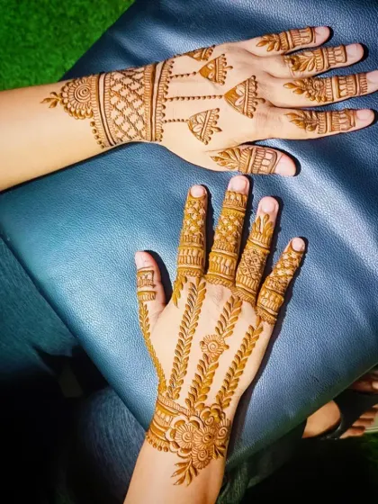 This photo shows the designs from the side, highlighting the finger details.