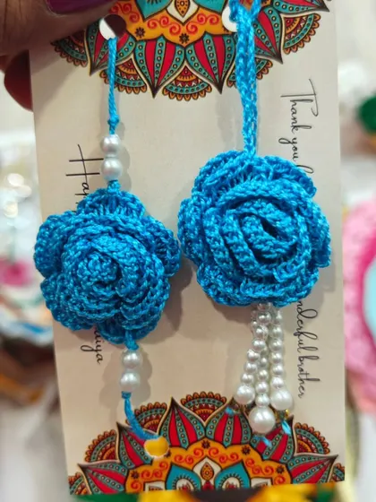 The same beautiful rose lumba rakhi design, here in a stunning shade of blue. A perfect choice for your sister-in-law.