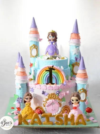 The full view of this magnificent princess castle cake, showcasing all the different princesses and whimsical details that make it so special.