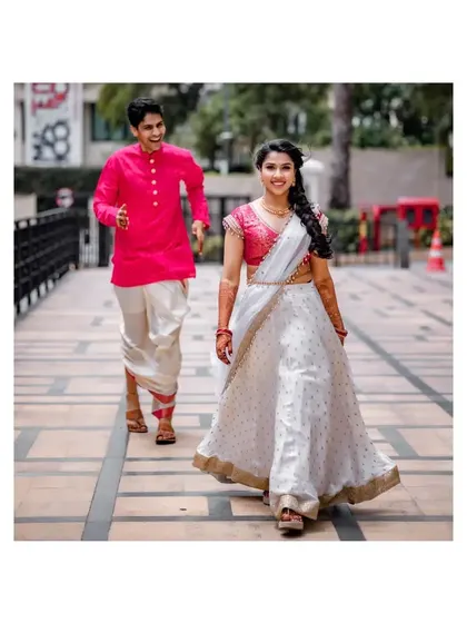 A dynamic shot of the couple walking together. Even your entrance can be choreographed to feel special and full of energy, setting the tone for a wonderful celebration.