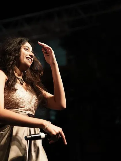 A candid moment on stage. Every show is a new experience, and I'm always grateful for the opportunity to perform.