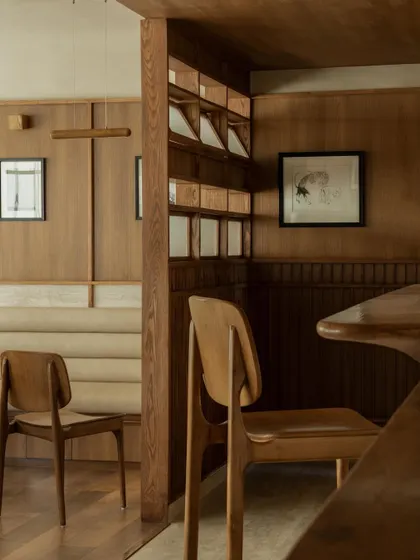 Further images from the BeWell, QBF Coffee, and Tubu projects, illustrating the consistent use of natural materials, clean lines, and thoughtful lighting to create serene and restorative commercial spaces.