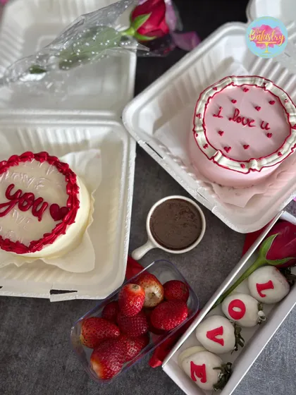 Our full Valentine's Day special spread. This includes our popular bento cakes, a box of white chocolate-coated strawberries that spell "LOVE", and a DIY box of fresh strawberries with a milk ganache dip.