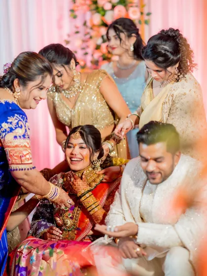 Surrounded by family, the bride is the center of attention. Her makeup is designed to look beautiful from all angles and in all lighting conditions, from formal portraits to candid ceremony shots.